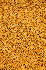 Nuts, food background from a texture of raw chickpeas close-up, Pile of raw chickpeas for sale in the market, Chickpea on dark wooden background, Food background from raw uncooked chickpeas.  
