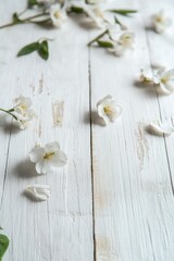 Naklejka premium Close-up of delicate cherry blossom petals on a weathered wooden surface, creating an artistic and serene atmosphere.