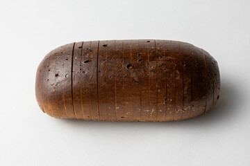 Whole Rye Bread Loaf with Dark Crust on White