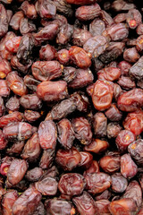 small sized dates in large quantity, dates in large quantity, ark color dates, Healthy food, Natural food, Dried Fruit, dates on a market stall, 
