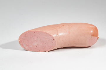 Sausages, semi-finished meat products, salads on a white background