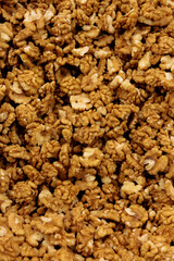 Tasty shelled walnuts as background, Walnuts close-up, mage of organic walnuts, Full frame top view of heap of fresh raw brown crispy walnuts arranged on surface.

