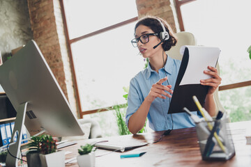 Photo of cheerful lady recruiter dressed shirt glasses headphones preparing papers modern device...