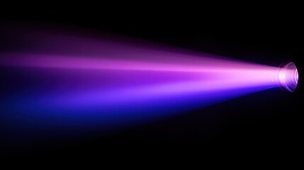 Fototapeta premium A bright, purple and blue light beam shoots out from a small, round source in the bottom right corner of the frame. The beam fades into darkness as it travels to the left side of the image.