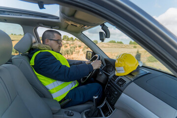 Wind turbine inspector driving to inspection site, renewable energy © Floren Horcajo