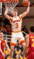 Young Basketball Player Executes a Powerful Slam Dunk During an Intense High School Basketball Game