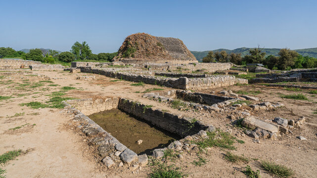 Scenic landscape view of the buddhist ruins of Dharmarajika, the Great Stupa in ancient Taxila, Punjab, Pakistan, a UNESCO World Heritage site