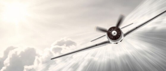  A propeller plane flies against a backdrop of cloudy sky, with sunbeams stretching across the foreground