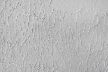 White concrete wall texture background. cement wall. plaster texture for designers. Rough empty relief stucco wall