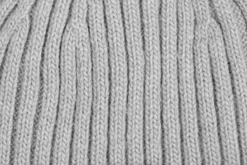 White natural texture of knitted wool textile material background. White cotton fabric woven canvas texture