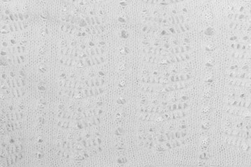 White natural texture of knitted wool textile material background. White cotton fabric woven canvas texture