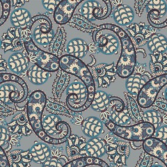 Turkish Cucumber Paisley seamless vector pattern in traditional Oriental style. Decorated with flowers, leaves, and fantasy elements, for fabric, textile and wallpaper covers