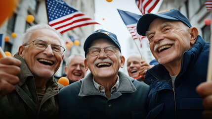 Fototapeta premium Group of smiling elderly men at a patriotic event, holding American flags and wearing casual outdoor clothing, enjoying the festive atmosphere in a city street.