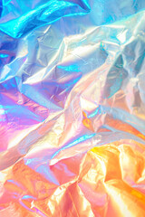 Fototapeta premium Vertical Colorful iridescent, holographic rainbow foil texture background.