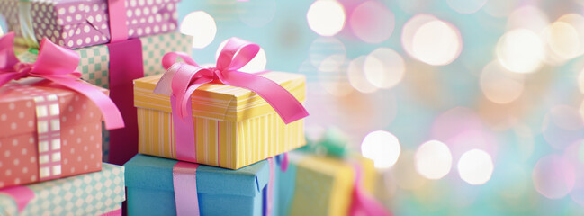 Colorful gift boxes with ribbons for Black Friday, Cyber Monday sale, holiday shopping concept