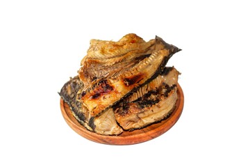 Pictures of dried fish put on wooden plates in isolated and white background, concept food.