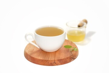 Pictures of hot tea put on wooden plates and white background, isolate photo style.