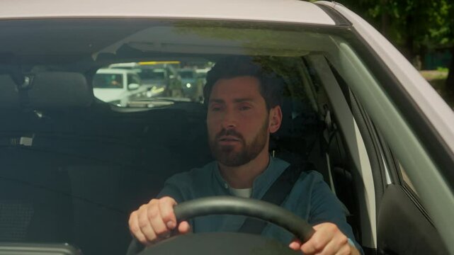 Caucasian man guy businessman driving car in city stuck traffic jam urban road transport problem accident angry aggressive mad furious male driver transport stressful drive automobile shouting scream