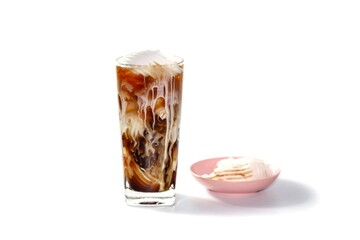 Ready for drink with Americano ice coffee serving with coconut milk slices put on white background with isolated concept.