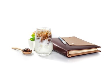 Serving special menu with latte ice coffee on white background with isolated concept,relaxed feeling photo style.milk and coffee beans,book,flowers background.