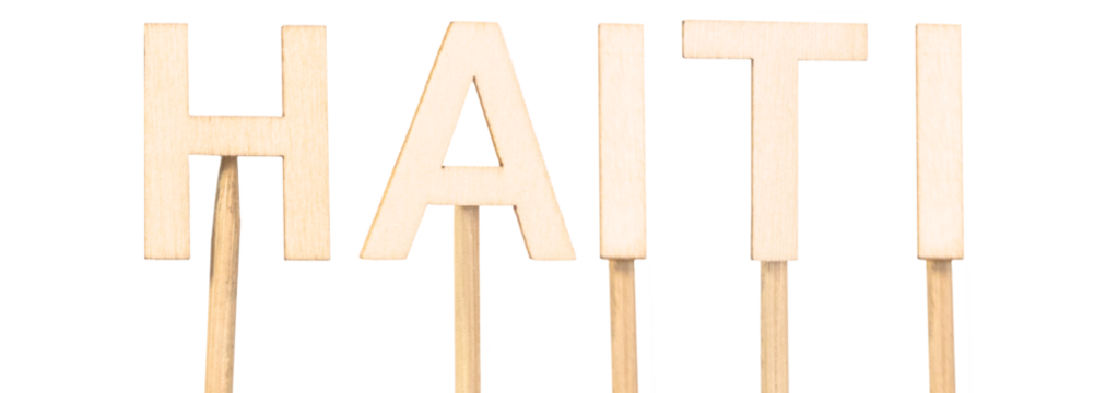 Haiti in wooden letters: a rustic and ecological style in a modern design. Wooden sign.