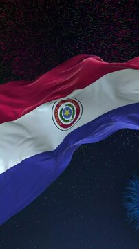 Paraguay flag - Waving flag on celebrating fireworks for national holiday day. Ceremony for patriotic celebration of nation