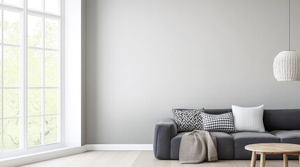 Cozy living room with modern gray sofa and natural lighting in a minimalist design setting