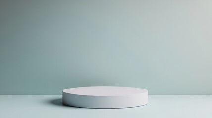 Minimalist display pedestal against a soft green background, perfect for showcasing products or artwork in a stylish setting.