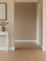 Fototapeta premium A bright, minimalist hallway with white walls, modern art hanging on the walls, and a sleek white console table with a small vase of flower