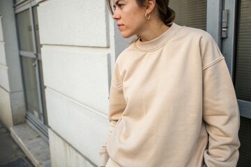 Beige Sweatshirt Mockup - Woman Wearing Casual Apparel