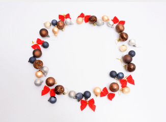 Christmas composition. Christmas gift, pine cones, fir tree branches on white background. Top view, flat lay, copy space