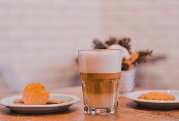 cup of coffee with cookies