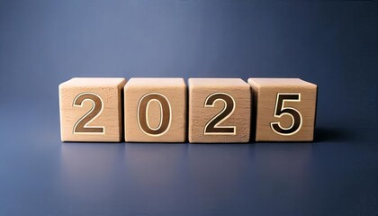 Wooden blocks displaying year 2025 on dark background, symbolizing future planning and goals