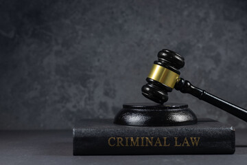 Law concept. Law book, Judge's gavel on dark background