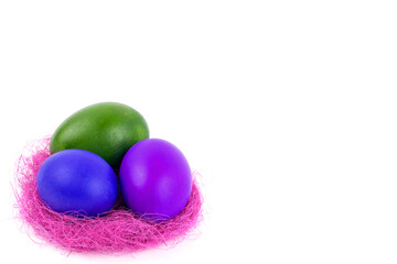 easter eggs in a nest on a white background