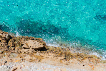 Crystal Clear Waters Along the Rocky Coastline of Greece