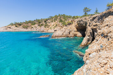 Fototapeta premium Crystal Clear Waters Along the Rocky Coastline of Greece