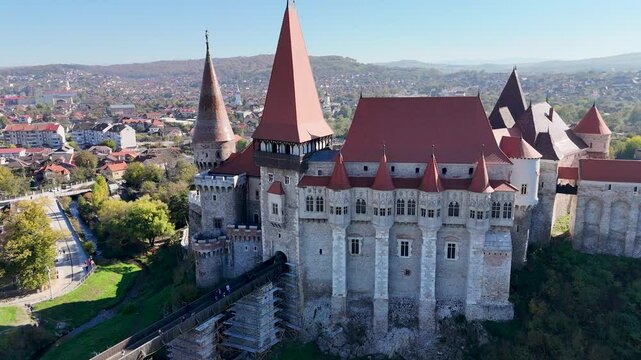 Stunning Aerial Drone Footage of Corvin Castle in Hunedoara, Romania - Iconic Gothic Medieval Fortress, Perfect for Historical, Travel, and Architectural Projects Highlighting Romania&rsquo;s Rich Heritage