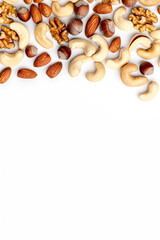 Vertical Mixed nuts isolated on white background. Top view.