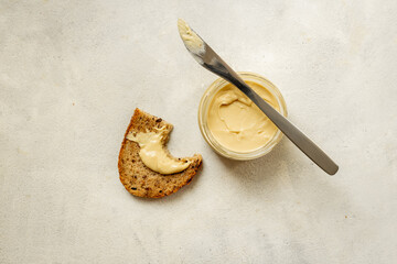 Vegan coconut butter cream with multigrain bread. Sugar and lactose free breakfast