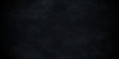 Fototapeta premium Dark black colored grunge old aged retro vintage stone concrete cement blackboard chalkboard wall backdrop floor texture. Black anthracite dark gray wall retro old slate grunge backdrop background.