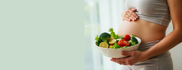Pregnant woman with bowl of fresh vegetables. Prevention of anemia. Healthy nutrition, balanced diet during pregnancy. Prenatal care concept, weight control, 