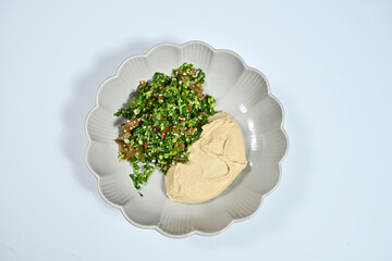 Bowl with food and assorted vegetables