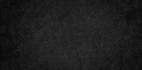 Distressed rough black grunge cracked wall slate texture. Chalk board and Black board grunge backdrop background. Wall grunge backdrop rough background dark black and stone.