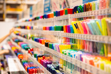 hundreds of pens on display at a stationery shop