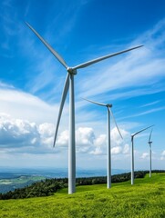 Fototapeta premium Wind turbines stand tall against a backdrop of blue sky and rolling green hills, symbolizing the power of renewable energy, sustainability, and a bright future.