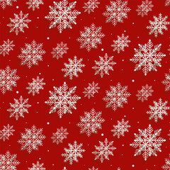 Christmas pattern with snowflakes on a red background. Seamless background perfect for use in textiles, wallpapers, and festive decorations.