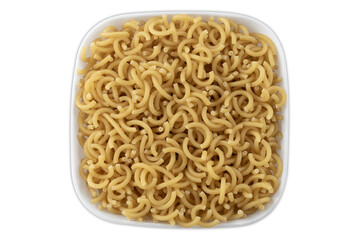 Raw fideuá noodles in a white bowl on a white background