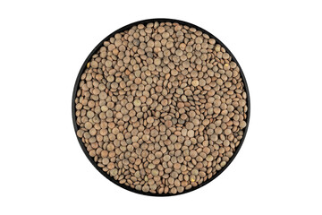Raw lentils (Lens culinaris) in an eco-friendly black circular bowl on a white background from Lanzarote Island, Canary Islands, Spain