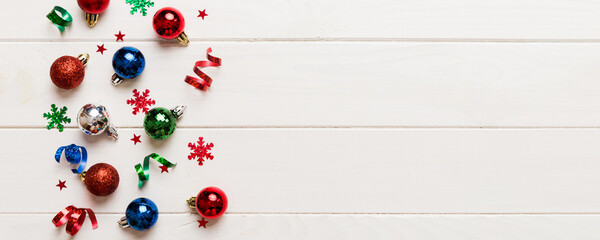 Christmas composition. a pattern of christmas balls on colored background. Flat lay, top view New year decor